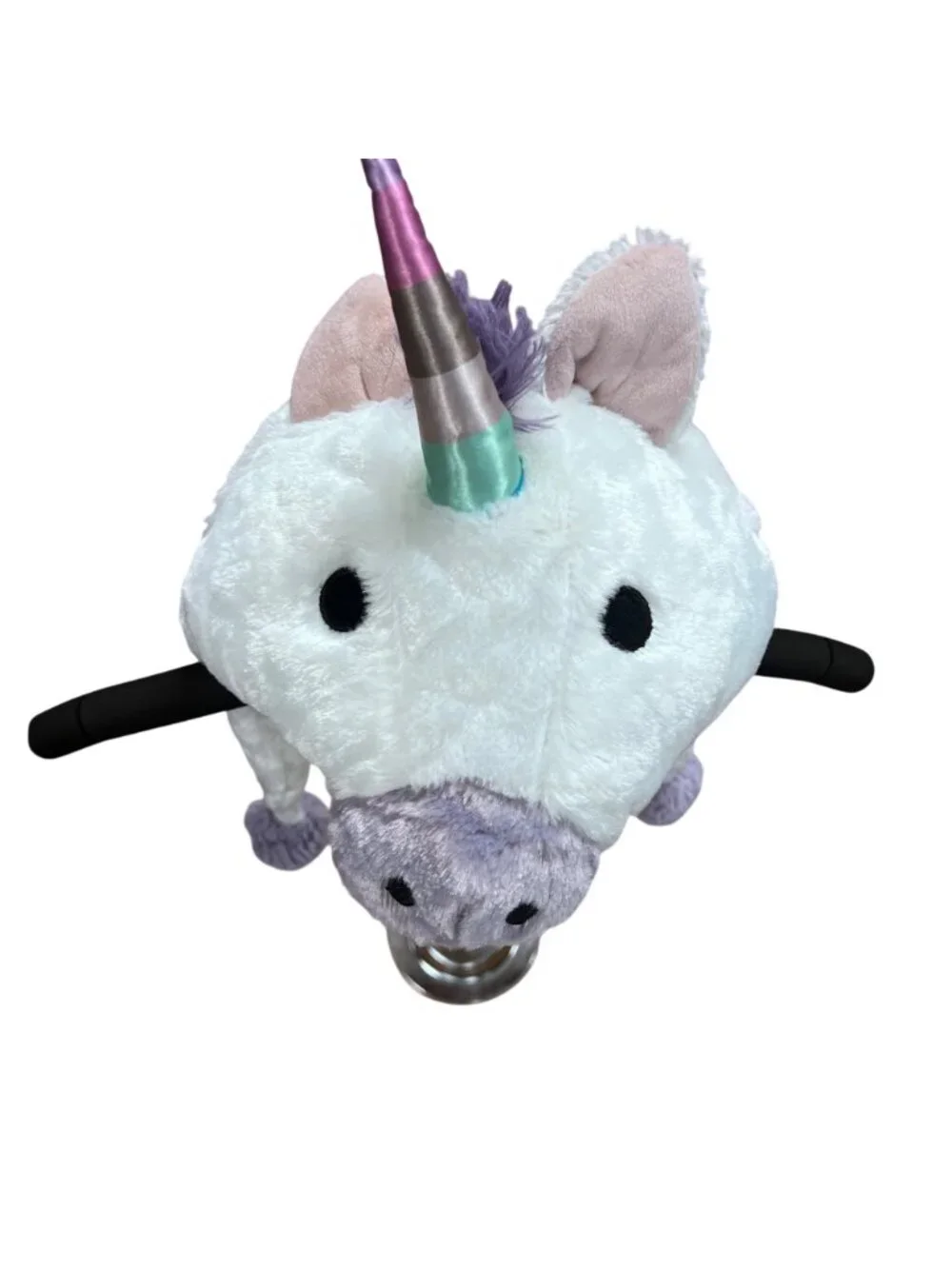 Plush Unicorn Hat with pom-pom ear flaps, whimsical, fun, playful